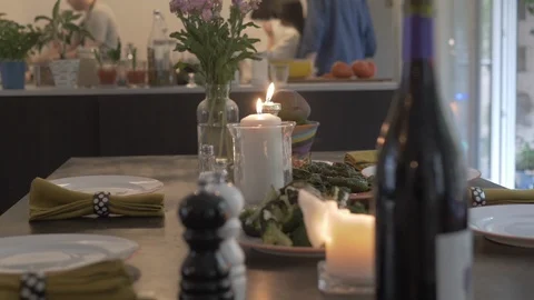 Handheld shot of friends working in the kitchen 스톡 동영상 114842433