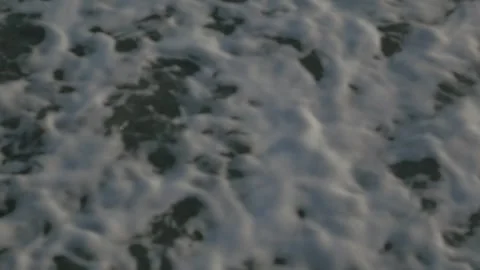 Handheld Shot of Gentle Ocean Waves Rolling onto Depok Beach Near Yogyakarta Stock Footage 302524196