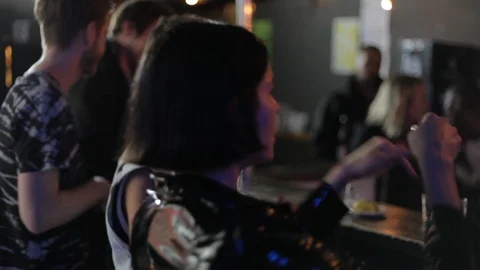 Handheld shot of group of people dancing in the club 스톡 동영상 114847228