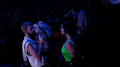 Handheld shot of group of people dancing and greeting each other 스톡 동영상 114886118