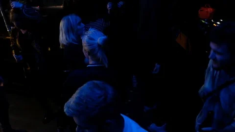 Handheld shot of group of people dancing in the club Video stock 114886125