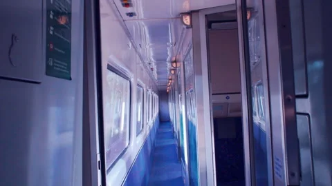Handheld Shot inside train Carriage With Light Passing Through Windows Stock Footage 260283496