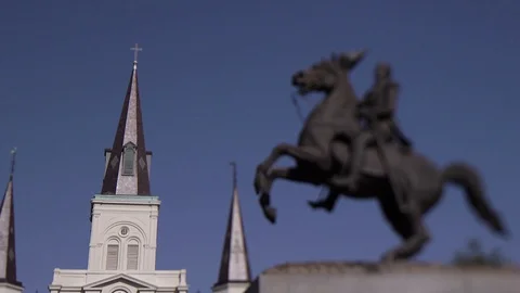 Handheld Shot of Jackson Sq. New Orleans, Statue and Cathedral Stock Footage 127592746