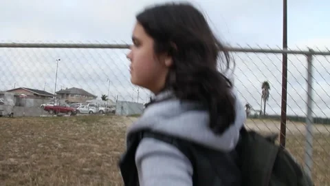 Handheld shot kid walking to school Stock Footage 155489070