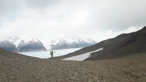 Handheld shot of man in mountains making video on phone, Patagonia, Chile Stock Footage 137965966