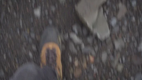 Handheld shot of man walking Stock Footage 118654612