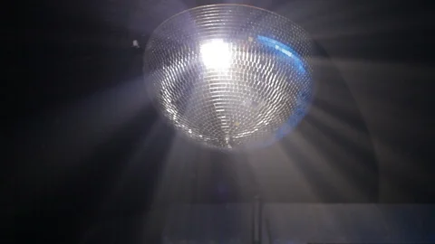 Handheld shot of mirror ball on ceiling of nightclub Video stock 114848188