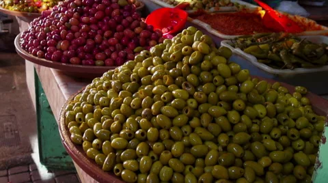 Handheld shot of olives on display in a souk in Marrakesh Stock Footage 47799333