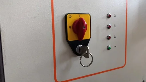 Handheld shot of person switching machine button in factory Stock Footage 120431460