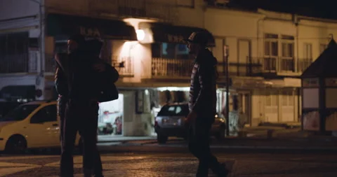 Handheld shot of pro surfer Bruno Valente at night in city meeting with surfers Stock Footage 158716242