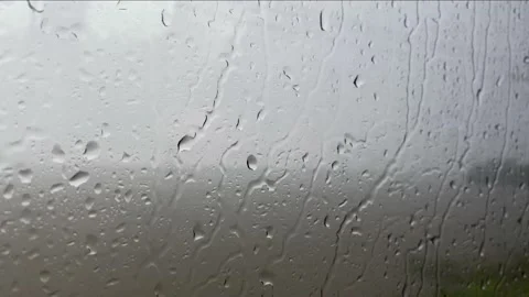 Handheld shot of rainy day, looking out car bus window, overcast, day Stock Footage 219983317