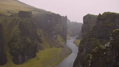 Handheld shot of river flowing through canyon Stock Footage 118654673