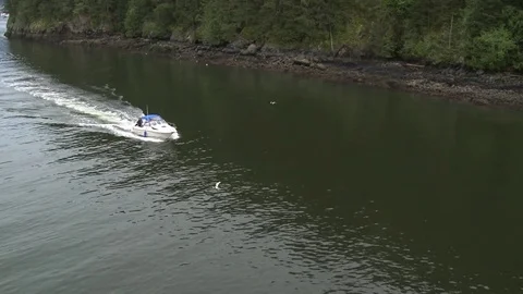 Handheld shot sequence from ferry of boats and islands Stock Footage 75249618