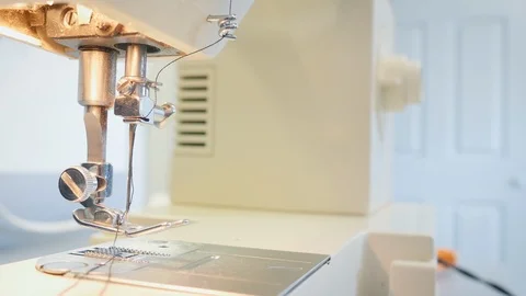 Handheld Shot of a Sewing Machine in 4k Stock Footage 88604098