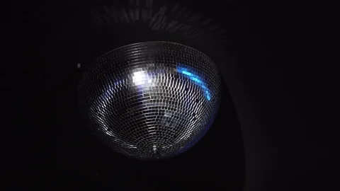 Handheld shot of shining disco ball on ceiling Stock Footage 114876248