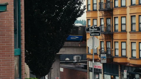 Handheld shot of skytrain going through New Westminster Stock Footage 244542133