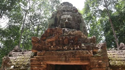 Handheld shot of stone gates in Angkor Wat temple complex, in Siem Reap, Cambodi Stock Footage 155623907