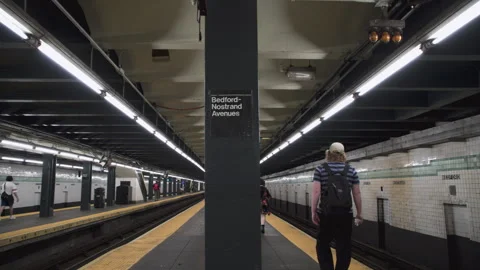 Handheld shot of a subway station in Brooklyn Видео 336469218