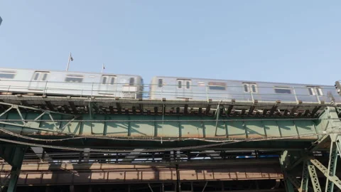 Handheld shot of a subway train directly above Stock Footage 275807549