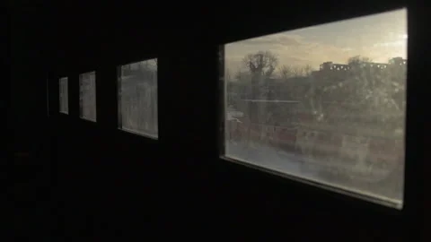 Handheld shot of sun coming through windows slow morion Stock Footage 131153739