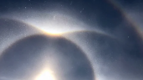 Handheld shot sun in diamond shape with halo and sparkles Video stock 114885234