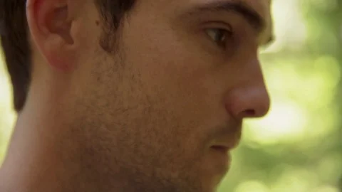 Handheld shot of thoughtful man Stock Footage