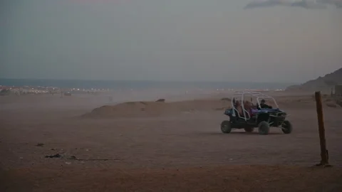 Handheld shot of tourists on two ATV's and a buggy car. Stock Footage 331161287