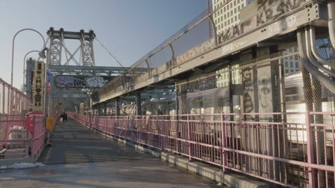 Handheld shot of the train crossing The Williamsburg Bridge Stock Footage 266386050