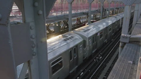 Handheld shot of the train crossing The Williamsburg Bridge Stock-Footage 266387027