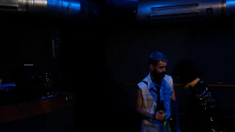 Handheld shot of two people dancing in the club 스톡 동영상 114886114