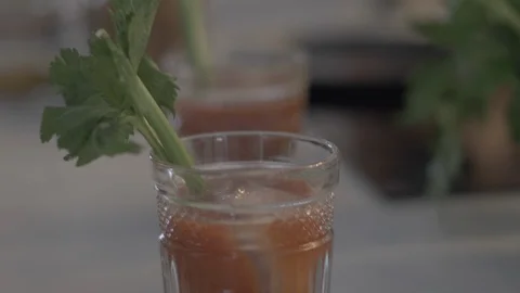 Handheld shot of two people making bloody mary Stock Footage 114842110