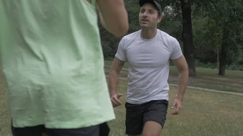 Handheld shot of two young men exercising together Video stock 114843529