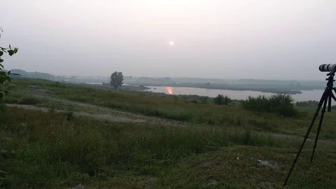 Handheld shot of videographer location with camera on a tripod. The picturesque Stock Footage 75467535