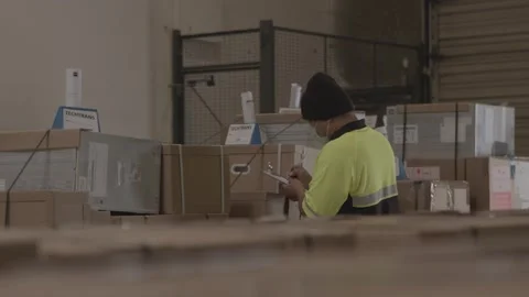 Handheld Shot Of Warehouse Worker Working During Covid 19 1 Stock Footage 168162908