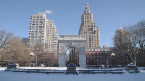 Handheld shot of Washington Square Park on a winter morning Stock Footage 328337219