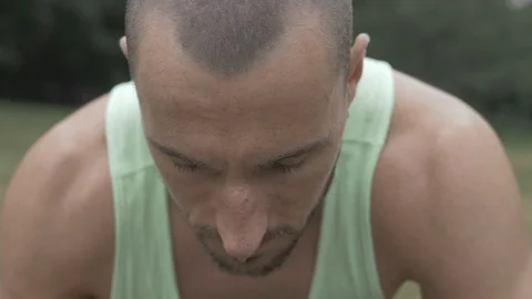 Handheld shot of young man doing push-up Video stock 114843591