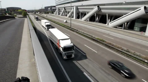 Handheld shot/dynamic camera of highway A3, passing trucks Stock Footage 36890414