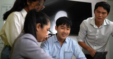 Handheld slow motion shot, Selective focus, Asian Young male workers checking Stockbeeldmateriaal 224034271