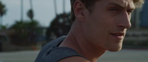 Handheld slow motion shot of young adult caucasian man looking around himself Stock Footage 120289469