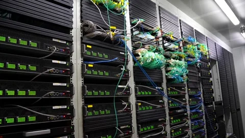 Handheld Slow Pan Down Active Server Racks with Blinking Lights and Network.. Stock Footage 341699021
