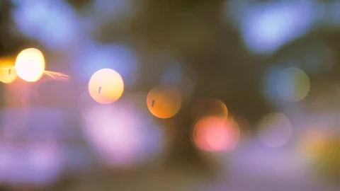 Handheld: Smooth stabilized camera movement, blurry lights in a sunset Stock-Footage 90652217