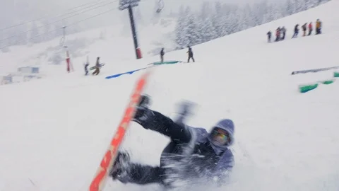 Handheld Snowboarder Falls Stock Footage 99261548
