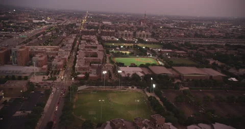 Handheld style drone shot of baseball field at dusk Stock Footage 146094328
