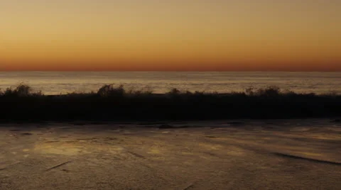 Handheld surf breaks at early dusk b, 60fps Video stock 24673311