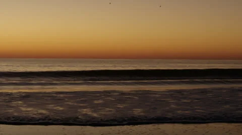 Handheld surf breaks at early dusk, 60fps Stock Footage 24674603