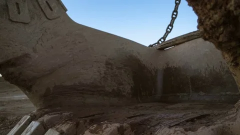 Handheld tilt-down close-up shot of dragline excavator bucket 15 cubic meters Video stock 75531362