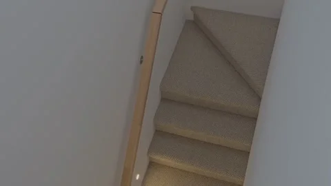 Handheld top down Luxury Home Stairs Wood Balustrade Interior Lighting Stock Footage 304092437