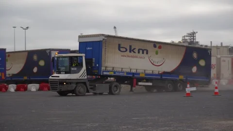Handheld Tracking Shot of Freight Train Loading Cargo in Normandy France 動画素材 337975891
