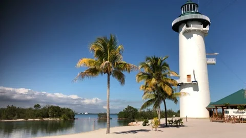 Handheld tracking shot of Harvest Caye and the lighthouse, Belize Stock Footage 151973541