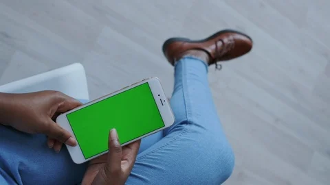 Handheld Vertical Shoot. Green Screen or Chroma key Tracking. Young African Stock Footage 121099297